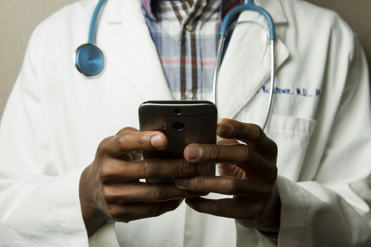 Australian GP consulting with patient using digital health