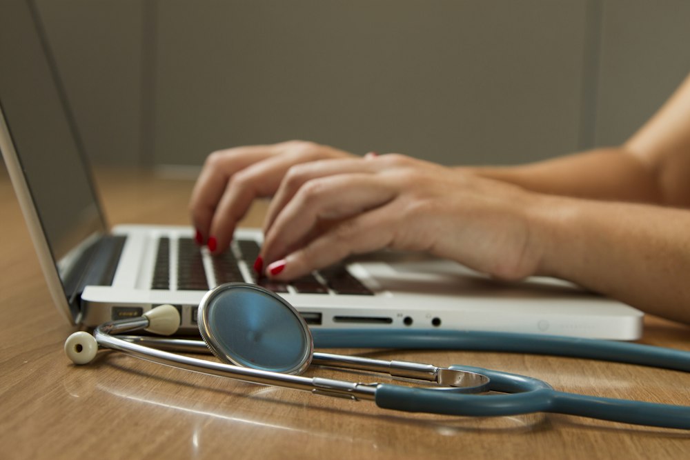 Doctor using tablet with guidelines